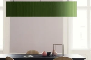 Modern conference room featuring suspended Acoufelt acouShade I Fluted Bar acoustic lighting over a long meeting table for linear illumination and sound control